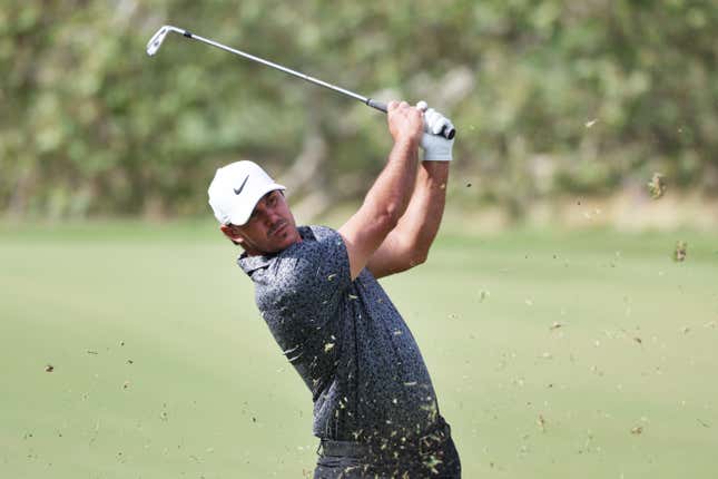 Brooks Koepka plays a shot on the third hole during a practice round prior to the 123rd U.S. Open Championship