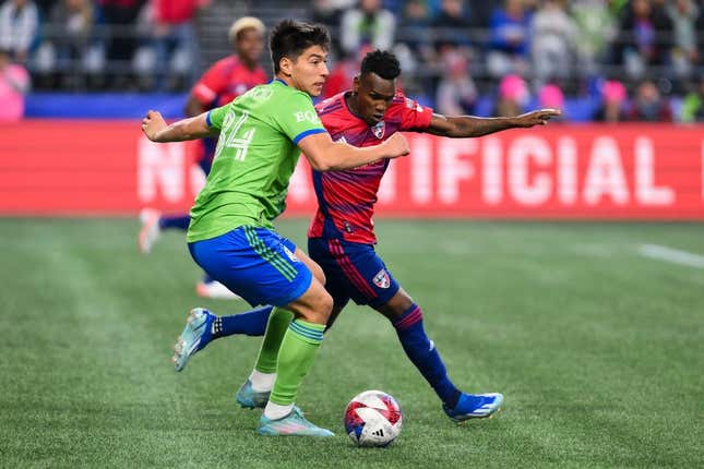 Nov 10, 2023; Seattle, Washington, USA; Seattle Sounders midfielder Josh Atencio (84) looks for a pass as FC Dallas forward J  der Obrian (8) defends during the first half at Lumen Field.