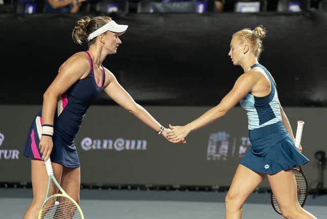 Nov 1, 2023; Cancun, Mexico; Babora Krejcikova (CZE) and Katerina Siniakova (CZE) during their doubles match against Coco Gauff (USA) and Jessica Pegula (USA) on day four of the GNP Saguaros WTA Finals Cancun.