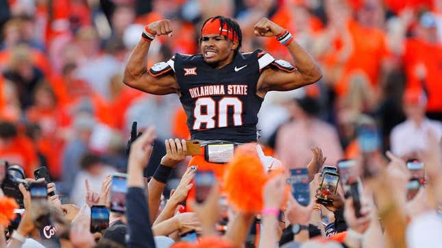 Brennan Presley and Oklahoma State faithful celebrate a big dub.