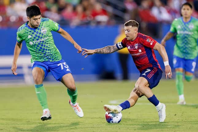 Nov 4, 2023; Frisco, Texas, USA; FC Dallas forward Paul Arriola (7) and Seattle Sounders midfielder Obed Vargas (73) during the second half of game two in a round one match of the 2023 MLS Cup Playoffs at Toyota Stadium.