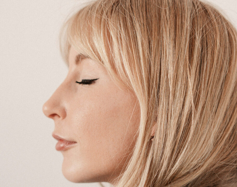 side profile of blonde-haired woman